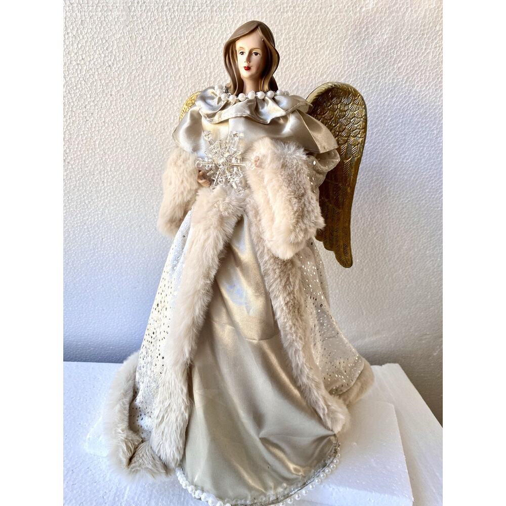 Christmas angel figure, often used as a tree topper
